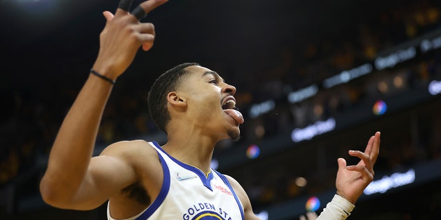 Golden State Warriors guard Jordan Poole celebrates after scoring against the Boston Celtics during the second half of Game 5 of basketball's NBA Finals in San Francisco, Monday, June 13, 2022.