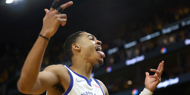 Golden State Warriors guard Jordan Poole celebrates after scoring against the Boston Celtics during the second half of Game 5 of basketball's NBA Finals in San Francisco, Monday, June 13, 2022.