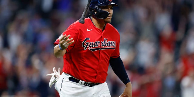 Cleveland Guardians' Josh Naylor tosses his bat after hitting a game-winning, two-run home run against the Minnesota Twins during the 10th inning of a baseball game Wednesday, June 29, 2022, in Cleveland.