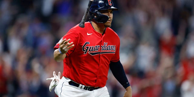 Cleveland Guardians' Josh Naylor tosses his bat after hitting a game-winning, two-run home run against the Minnesota Twins during the 10th inning of a baseball game Wednesday, June 29, 2022, in Cleveland.