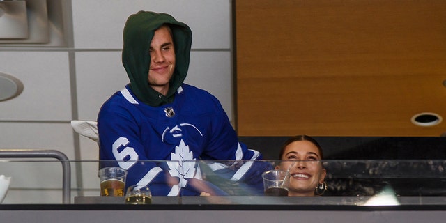 Hailey Baldwin and Justin Bieber take in the Maple Leafs game against the Philadelphia Flyers at the Scotiabank Arena on Nov. 24, 2018, in Toronto, Canada.