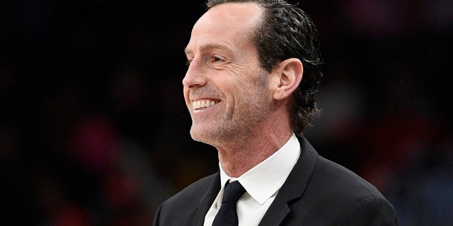 FILE - Brooklyn Nets coach Kenny Atkinson watches during the first half of the team's NBA basketball game against the Washington Wizards, Feb. 1, 2020, in Washington.