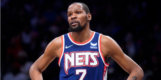 Brooklyn Nets forward Kevin Durant responds to a referee's call during the first half of a match against the Miami Heat on March 3, 2022 in New York.