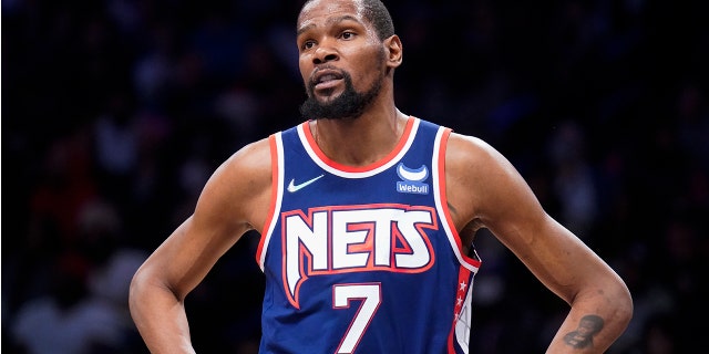 Brooklyn Nets forward Kevin Durant responds to a referee's call during the first half of a match against the Miami Heat on March 3, 2022 in New York.