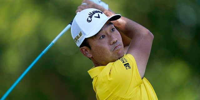 Kevin Na watches a tee shot off the third hole during the second round of the Charles Schwab Challenge at the Colonial Country Club May 27, 2022, in Fort Worth, Texas.