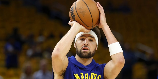 Golden State Warriors guard Klay Thompson warms up before Game 5 of the NBA Finals against the Boston Celtics in San Francisco, Monday, June 13, 2022.