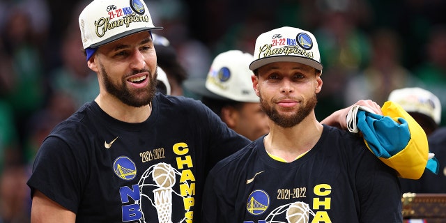  Stephen Curry #30 and Klay Thompson #11 of the Golden State Warriors celebrate after defeating the Boston Celtics 103-90 in Game Six of the 2022 NBA Finals at TD Garden on June 16, 2022 in Boston, Massachusetts.