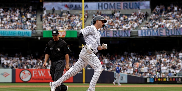 Kyle Higashioka rounds third base after hitting a home run against the Chicago Cubs during the third inning at Yankee Stadium on June 12, 2022, in New York City.
