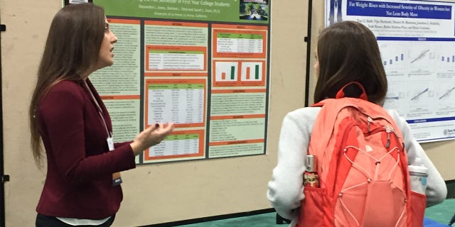 Jones (left) attended Pasadena City College in California, a community college, before transferring to the University of La Verne in California, to save on tuition costs. She's pictured giving a presentation at La Verne.