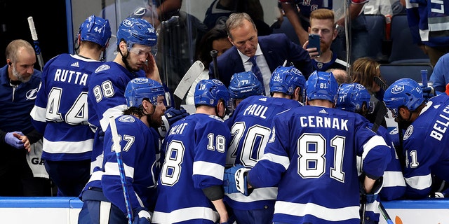 Tampa Bay Lightning head coach John Cooper talks with the team during their play against the New York Rangers during the third period in Game Four of the Eastern Conference Finals of the 2022 Stanley Cup Playoffs on June 07, 2022 at Amalie Arena.  Tampa, Florida.