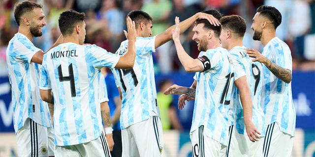 Lionel Messi of Argentina celebrates after scoring his team's fifth goal during the international friendly match between Argentina and Estonia at Estadio El Sadar on June 05, 2022 in Pamplona, Spain. 