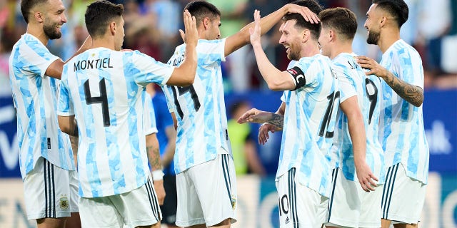 Lionel Messi of Argentina celebrates after scoring his team's fifth goal during the international friendly match between Argentina and Estonia at Estadio El Sadar on June 05, 2022 in Pamplona, Spain.