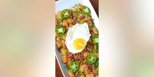 Breakfast tot nachos will be your new favorite nachos spin.