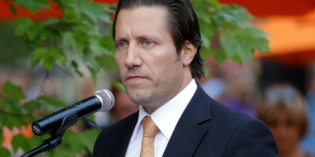 Lou Angelos, son of Orioles majority owner Peter Angelos, speaks at a ceremony before a game against the Boston Red Sox in Baltimore on Sept. 29, 2012.