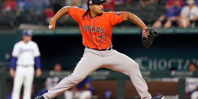 Houston Astros starting pitcher Luis Garcia throws during the first inning of a baseball game against the Texas Rangers in Arlington, Texas, Wednesday, June 15, 2022.