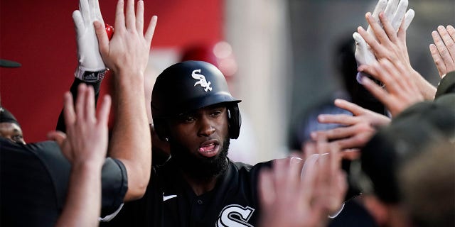 Chicago White Sox's Luis Robert is congratulated for his two-run home run during the fifth inning of a baseball game against the Los Angeles Angels on Tuesday, June 28, 2022, in Anaheim, Calif.