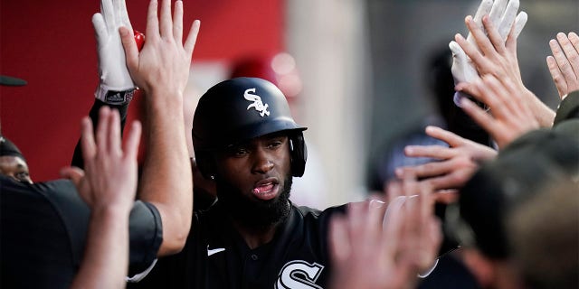 Chicago White Sox's Luis Robert is congratulated for his two-run home run during the fifth inning of a baseball game against the Los Angeles Angels on Tuesday, June 28, 2022, in Anaheim, Calif. 