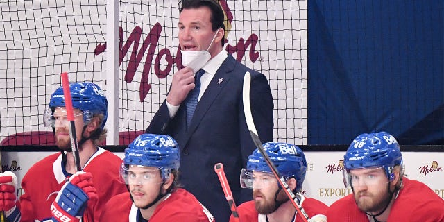 Assistant coach Luke Richardson of the Montreal Canadiens assumes head coaching responsibilities against the Vegas Golden Knights during the first period in Game Three of the Stanley Cup Semifinals of the 2021 Stanley Cup Playoffs at Bell Centre on June 18, 2021 in Montreal, Quebec. Head coach Dominique Ducharme , tested positive for COVID-19 earlier in the day.