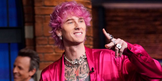 Machine Gun Kelly explained his decision to smash a glass on his own head.