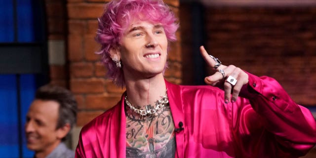 Machine Gun Kelly explained his decision to smash a glass on his own head.