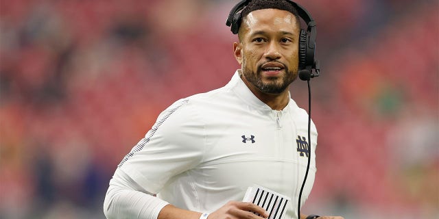 Head coach Marcus Freeman of the Notre Dame Fighting Irish during the PlayStation Fiesta Bowl at State Farm Stadium on January 01, 2022 in Glendale, Arizona. The Cowboys defeated the Fighting Irish 37-35.