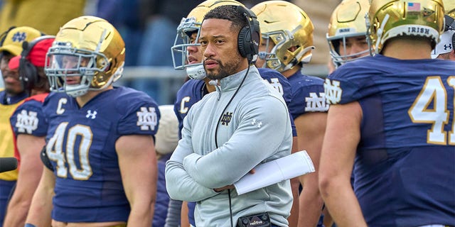 Notre Dame Fighting Irish defensive coordinator Marcus Freeman looks on during a game between the Notre Dame Fighting Irish and the Georgia Tech Yellow Jackets on November 20, 2021 at Notre Dame Stadium, in South Bend, IN. 