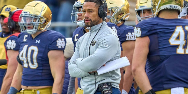 Notre Dame Fighting Irish defensive coordinator Marcus Freeman looks on during a game between the Notre Dame Fighting Irish and the Georgia Tech Yellow Jackets on November 20, 2021 at Notre Dame Stadium, in South Bend, IN. 