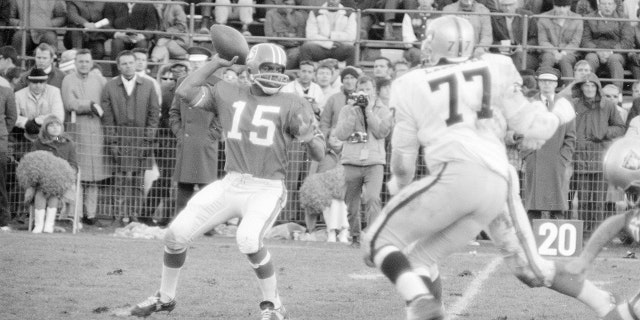 Denver QB Marlin Briscoe (15) in action vs Oakland Raiders at Mile High Stadium. Denver, CO 11/10/1968.