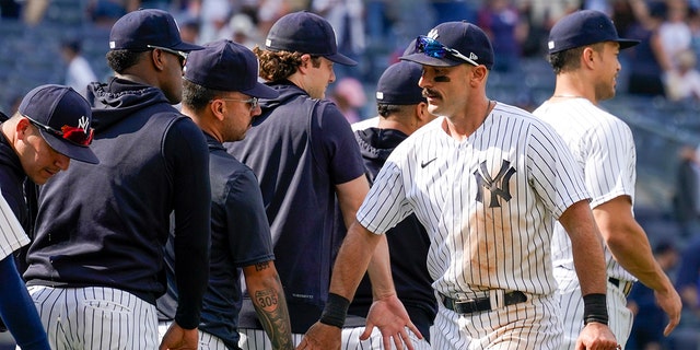 New York Yankees' Matt Carpenter celebrates with teammates after they defeated the Chicago Cubs, Sunday, June 12, 2022, in New York.