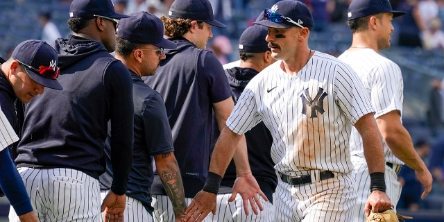 New York Yankees' Matt Carpenter celebrates with teammates after they defeated the Chicago Cubs, Sunday, June 12, 2022, in New York.