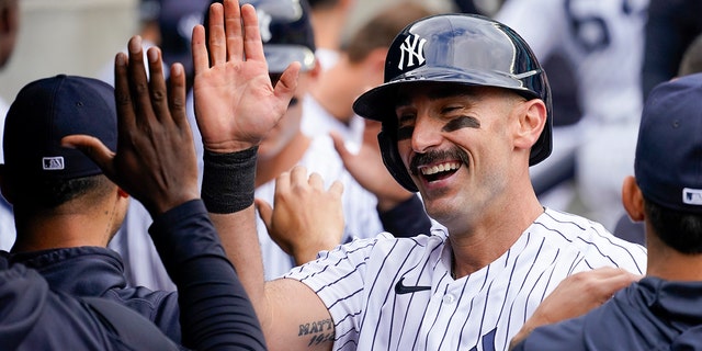 New York Yankees' Matt Carpenter celebrates after hitting a two-run home run in the sixth inning of a baseball game against the Chicago Cubs, Sunday, June 12, 2022, in New York. 