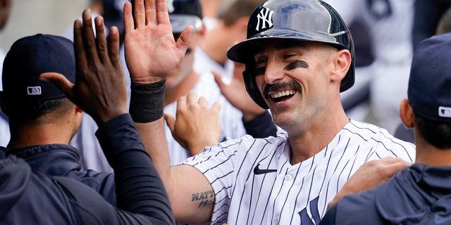New York Yankees' Matt Carpenter celebrates after hitting a two-run home run in the sixth inning of a baseball game against the Chicago Cubs, Sunday, June 12, 2022, in New York.