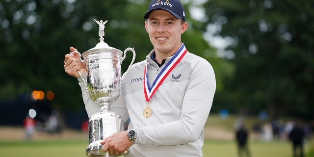 Matt Fitzpatrick of England celebrates with the U.S. Open Championship trophy after winning during the final round of the 122nd U.S. Open Championship at The Country Club on June 19, 2022 in Brookline, Massachusetts.