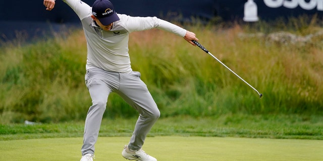 Matthew Fitzpatrick, of England, reacts after a putt on the 13th hole during the final round of the U.S. Open golf tournament at The Country Club, Sunday, June 19, 2022, in Brookline, Mass. 