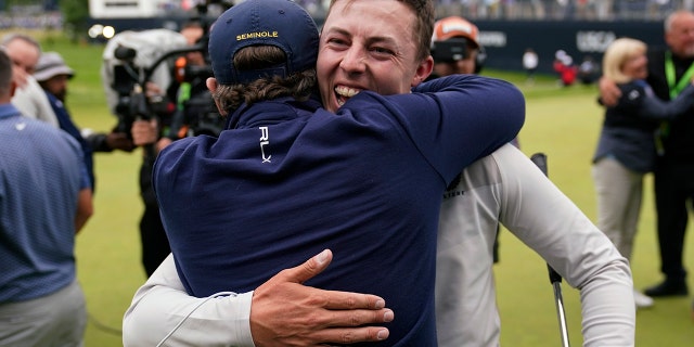 Matthew Fitzpatrick, of England, celebrates after winning the U.S. Open golf tournament at The Country Club, Sunday, June 19, 2022, in Brookline, Mass.