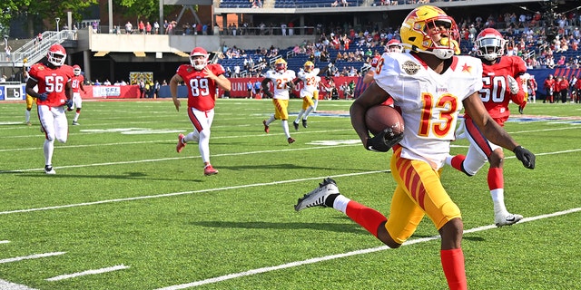 Maurice Alexander (13) of the Philadelphia Stars returns a punt for a touchdown in the fourth quarter against the New Jersey Generals at Tom Benson Hall of Fame Stadium June 25, 2022, in Canton, Ohio.
