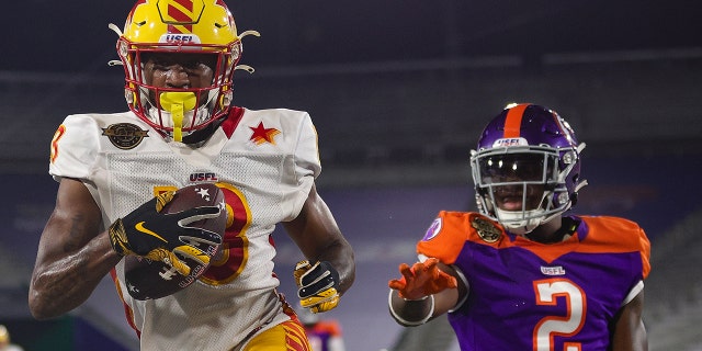 Maurice Alexander Jr. #13 of the Philadelphia Stars is run out of bounds under pressure from Terrell Bonds #2 of the Pittsburgh Maulers in the third quarter of the game at Protective Stadium on June 12, 2022 in Birmingham, Alabama.