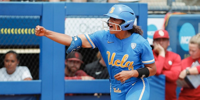 UCLA's Maya Brady (7) celebrates after a home run during the third inning of an NCAA softball Women's College World Series game against Oklahoma on Monday, June 6, 2022, in Oklahoma City.