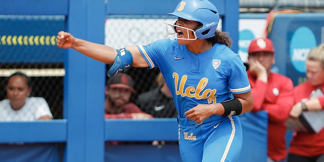 UCLA's Maya Brady (7) celebrates after a home run during the third inning of an NCAA softball Women's College World Series game against Oklahoma on Monday, June 6, 2022, in Oklahoma City.