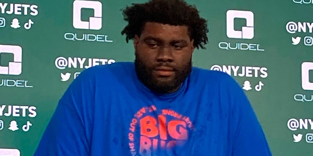 New York Jets offensive tackle Mekhi Becton speaks to reporters at the teams NFL football facility in Florham Park, N.J., Wednesday, June 15, 2022. The offensive tackle knows he is being written off by many, but insists he's going to make all of his critics "eat their words."