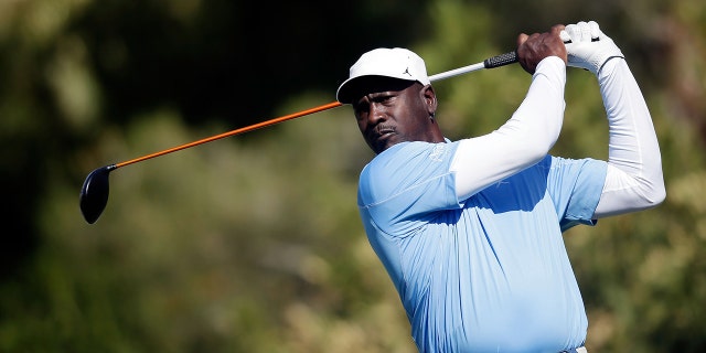 NBA legend Michael Jordan hits a tee shot during the ARIA Resort & Casino at Shadow Creek on April 3, 2014 in North Las Vegas, Nevada, the 13th Annual Michael Jordan Celebrity Invitational. 