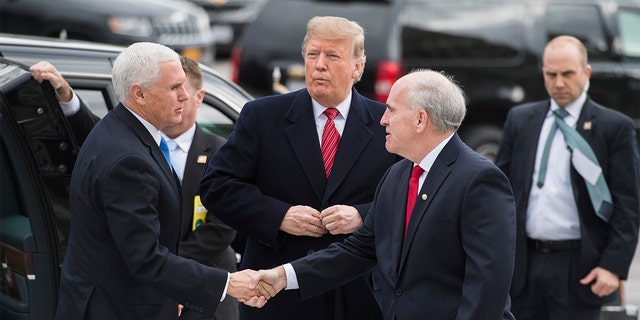President Donald Trump and Vice President Mike Pence greet Senate Sergeant at Arms Michael Stenger, right, upon arriving to the Capitol to attend the Senate Republican policy luncheons on Jan. 9, 2019. 