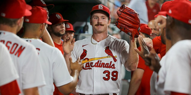 Cardinals pitcher Miles Mikolas is congratulated by teammates after being removed during the ninth inning against the Pittsburgh Pirates on Tuesday, June 14, 2022, in St. Louis.