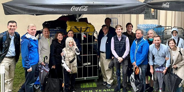 Members of a mission from Temple Emanu-El in Manhattan traveled to the Ukraine-Polish border recently to "bear witness," both to the struggles of the people of Ukraine and to those who are helping them pick up the pieces of their lives. Martin Bell is pictured at center (in front, in dark jacket and wearing glasses), along with other members of Temple Emanu-El. 