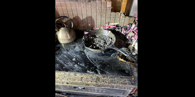 The aftermath of the cook top area of the stove following the fire on Friday in Parkville, Missouri.