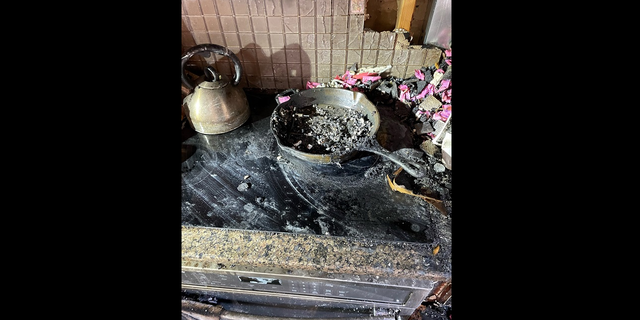 The aftermath of the cook top area of the stove following the fire on Friday in Parkville, Missouri.