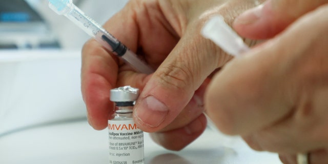 A healthcare worker prepares a syringe at a monkeypox vaccination clinic run by CIUSSS public health authorities in Montreal, Quebec, Canada, June 6, 2022. 