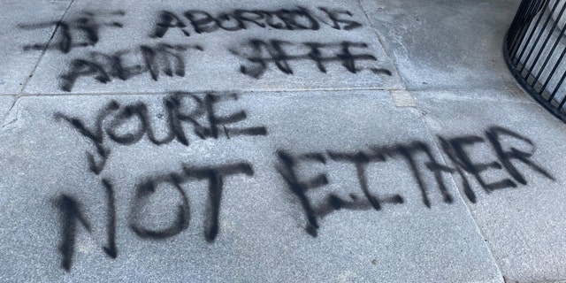Vermont capitol police said vandals broke seven windows across the front of the State House building and spray-painted the front portico with the message: "if abortions aren't safe you're not either."