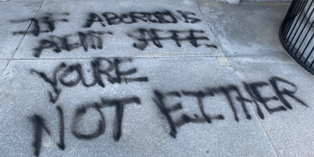 Vermont capitol police said vandals broke seven windows across the front of the State House building and spray-painted the front portico with the message: "if abortions aren't safe you're not either."