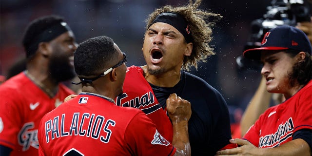 Cleveland Guardians' Josh Naylor, center, celebrates with Richie Palacios and Eli Morgan after hitting a game-ending, two-run home run during the 10th inning against the Minnesota Twins in a baseball game Wednesday, June 29, 2022, in Cleveland.